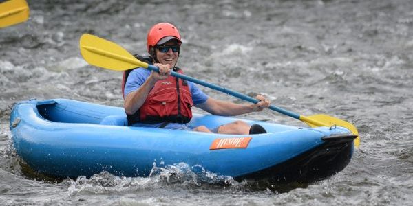 Kayaker enjoys the river on an inflatable kayak, or "funyak."