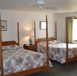 Bedroom in suite with two queen beds