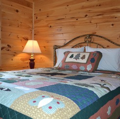 Double bed in a bedroom at the river cottage